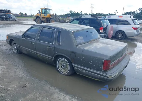 1991 Lincoln Town Car Executive z USA, uszkodzony, nr VIN 1LNCM81W9MY732357